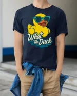 Cool Rubber Duck Wearing Sunglasses What The Duck Tshirt - model wearing navy tee with hands in pockets