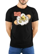 Fragile Mind Cracked Egg Skull Funny Sarcastic Graphic Tshirt - model wearing black tee with hands behind back