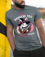 Wicked Easter Witch Bunny Chainsaw Horror Graphic Tshirt - model wearing grey tee, leaning on column