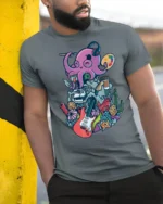 Artistic Octopus Painter Headphone Musician Graphic Tshirt - model wearing grey tee, leaning on column