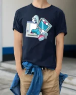 Retro Computer Character Breaking From Software Graphic Tshirt - model wearing navy tee with hands in pockets