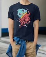 Whimsical Deep Sea Jellyfish Wide Eyed Ocean Graphic Tee - model wearing navy tee with hands in pockets