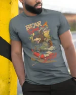 Adventurous Bear Scout Skater Retro Outdoor Graphic Tshirt - model wearing grey tee, leaning on column