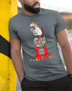 Charming Scholarly Unicorn Reading Newspaper Gumball Tshirt - model wearing grey tee, leaning on column