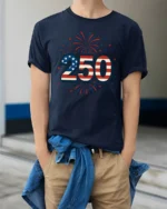 Patriotic Fireworks American Flag 250 Years Graphic Tee - model wearing navy tee with hands in pockets