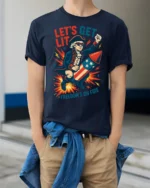 Amusing Freedom’s On Fire George Washington Patriotic T shirt - model wearing navy tee with hands in pockets