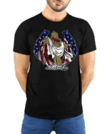 Patriotic Angel Wings Wooden Cross USA Flag Graphic Tee - model wearing black tee with hands behind back