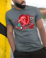 Animate Broken Heart Cartoon Character Street Graphic Tee - model wearing grey tee, leaning on column