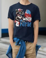 Sarcastic Red White And Feral Raccoon Patriotic Graphic Tee - model wearing navy tee with hands in pockets