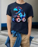 Patriotic Dinosaur Riding Monster Truck 4th Of July Tee - model wearing navy tee with hands in pockets