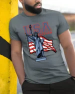 Patriotic Statue Of Liberty USA Freedom National Pride Tee - model wearing grey tee, leaning on column