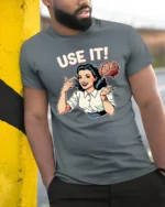 Retro Pop Art Use It Mind Intelligent Thinker Graphic Tee - model wearing grey tee, leaning on column
