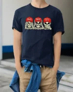 Politically Satirical Skeleton Wise Monkey Mocking Graphic Tee - model wearing navy tee with hands in pockets