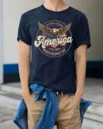 Commemorative Semiquincentennial Eagle America 1776 2026 Tshirt - model wearing navy tee with hands in pockets