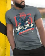 Historic Independence 1776 Eagle Home Of The Brave Tshirt - model wearing grey tee, leaning on column