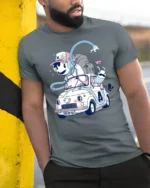 Whimsical Animated Character Vintage Car Road Trip Tshirt - model wearing grey tee, leaning on column