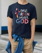 Spiritual One Nation Under God Patriotic Cross Graphic Tee - model wearing navy tee with hands in pockets