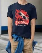 Vintage Chicago Lit Since 1871 Great Fire Cow Graphic Tee - model wearing navy tee with hands in pockets