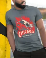 Vintage Chicago Lit Since 1871 Great Fire Cow Graphic Tee - model wearing grey tee, leaning on column
