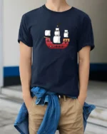 Cute Cartoon Pirate Ship Minimal Style Ocean Adventure Graphic Tee Tshirt - model wearing navy tee with hands in pockets