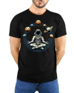 Astronaut Meditation Space Planets Zen Cosmic Graphic Tee Tshirt - model wearing black tee with hands behind back