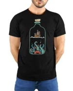 Ship In A Bottle Kraken Ocean Adventure Graphic Tee Tshirt - model wearing black tee with hands behind back