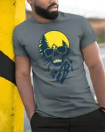 Cool Skull Camping Graphic Tee Outdoor Adventure Sunset Tshirt - model wearing grey tee, leaning on column