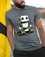 Adorable Robot on Tracks Tech Lover Graphic Tee Tshirt - model wearing grey tee, leaning on column