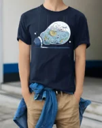 Surreal Lightbulb Cocktail World Aesthetic Graphic Tshirt - model wearing navy tee with hands in pockets