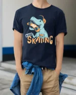 Funny Dinosaur Skater Keep Skating Graphic Soft Tshirt - model wearing navy tee with hands in pockets