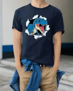 Scary Blue T-Rex Dinosaur Breaking Through Graphic Tshirt - model wearing navy tee with hands in pockets
