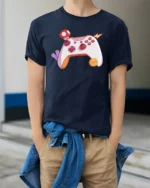 Retro Video Game Controller with Power-Up Mushroom Soft Tee - model wearing navy tee with hands in pockets
