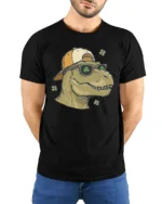 Cool St Patrick’s Day T-Rex Clover Sunglasses Soft Tee - model wearing black tee with hands behind back