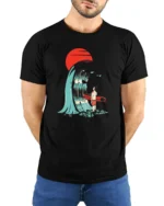 Surreal Surfer Sunset Giant Wave Graphic Soft Tshirt - model wearing black tee with hands behind back