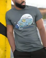 Surreal Lightbulb Cocktail World Aesthetic Graphic Tshirt - model wearing grey tee, leaning on column