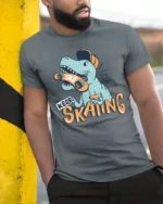 Funny Dinosaur Skater Keep Skating Graphic Soft Tshirt - model wearing grey tee, leaning on column