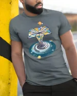 Cosmic Portal Galaxy Planets Retro Space Art Graphic T Shirt - model wearing grey tee, leaning on column