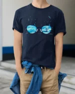 Aesthetic Cosmic Eyewear Surreal Sea Galaxy Premium Tshirt - model wearing navy tee with hands in pockets