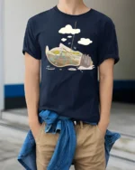 Cool Skeleton Surfer Riding Giant Retro Wave Soft Tshirt - model wearing navy tee with hands in pockets