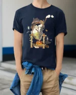 Magical Fire Demon Cooking Breakfast Premium Tee - model wearing navy tee with hands in pockets