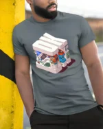 Retro Isometric OK Tech and Gaming Sanctuary Soft Tshirt - model wearing grey tee, leaning on column