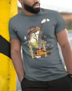 Magical Fire Demon Cooking Breakfast Premium Tee - model wearing grey tee, leaning on column