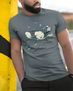 Surreal Space Astronaut Eyeglasses Fish Graphic Soft Tshirt - model wearing grey tee, leaning on column