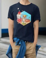 Isometric Underwater Kingdom Adventure Kraken Giant Octopus Tee - model wearing navy tee with hands in pockets