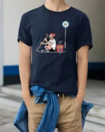 Hipster Old Man Skateboard Dog Commuter Funny Graphic Tee - model wearing navy tee with hands in pockets