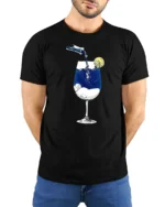 Creative Dreamy Starry Night Midnight Wine Glass Graphic Tshirt - model wearing black tee with hands behind back