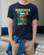Discover Minnesota State Animal Collage Explorer Soft Tshirt - model wearing navy tee with hands in pockets