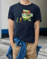 Futuristic Fast Food Mecha Mobile Diner Graphic Tshirt - model wearing navy tee with hands in pockets