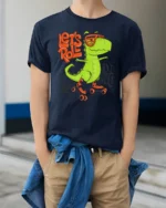 Funny Lets Roll Dinosaur Roller Skating Graphic Tshirt - model wearing navy tee with hands in pockets