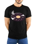 Surreal Astronaut Vinyl Record Space Galaxy Graphic Tshirt - model wearing black tee with hands behind back